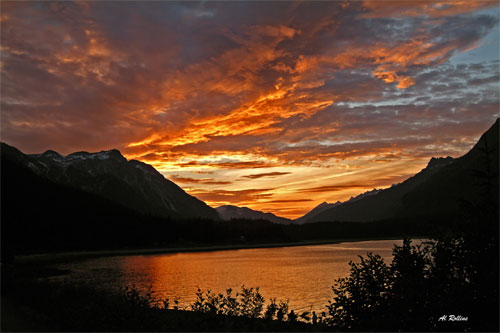Sunset Muncho Lake by Albert Rollins
